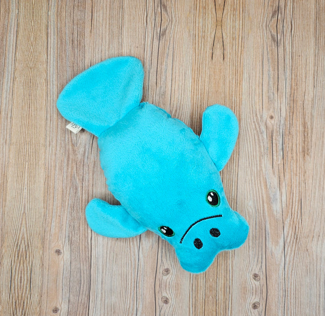 top down view of teal plush manatee dog toy option