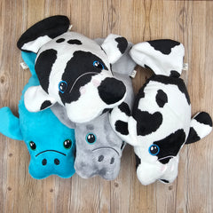 Main picture showing all 3 variations of plush manatee dog toys