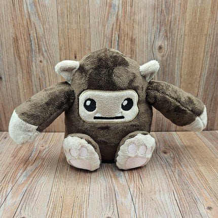 image of bigfoot plush, sitting up