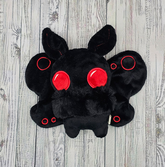 image of the mothman plush, front view