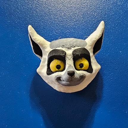front view of magnet shaped like a lemur head