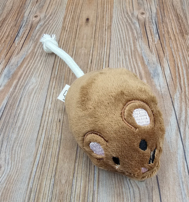 Brown plush mouse cat toy with a white rope tail on a wooden surface
