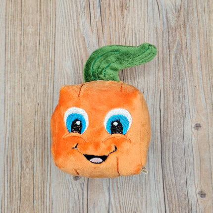 image of small plush pumpkin dog toy