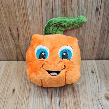 image of small plush pumpkin dog toy
