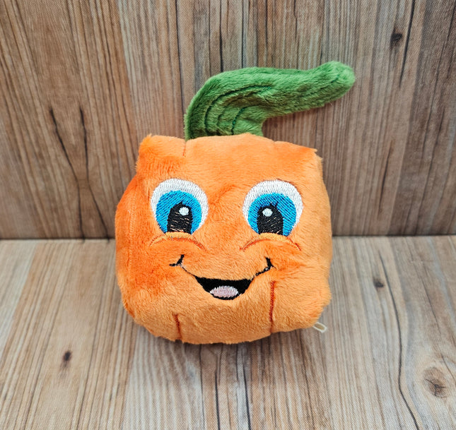 image of small plush pumpkin dog toy