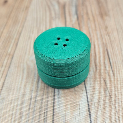 image of green compact scent vessel