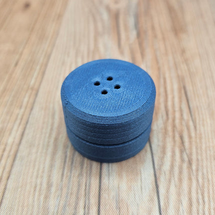 image of blue compact scent vessel