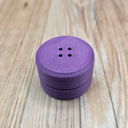 image of purple compact scent vessel