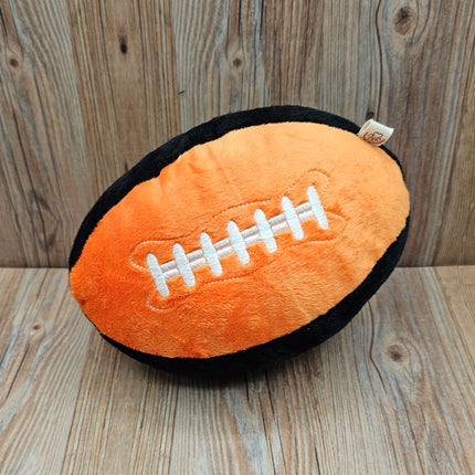 image of plush football dog toy in orange/black with embroidered laces