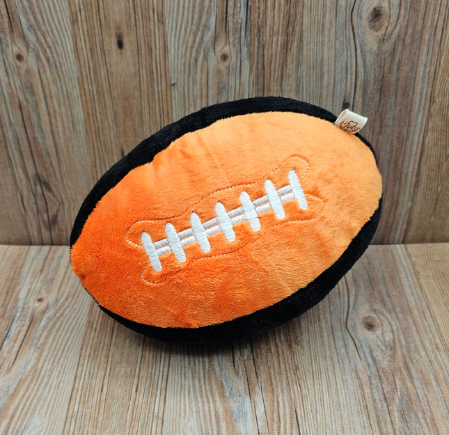 image of plush football dog toy in orange/black with embroidered laces