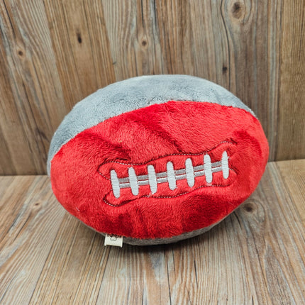 image of plush football dog toy in red/gray with embroidered laces