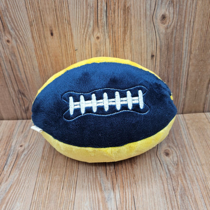 image of plush football dog toy in blue/yellow with embroidered laces