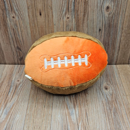 image of plush football dog toy in orange/brown with embroidered laces