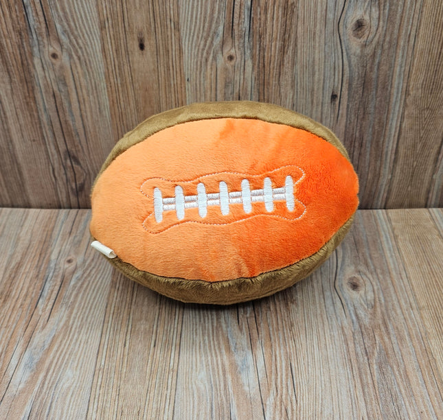 image of plush football dog toy in orange/brown with embroidered laces