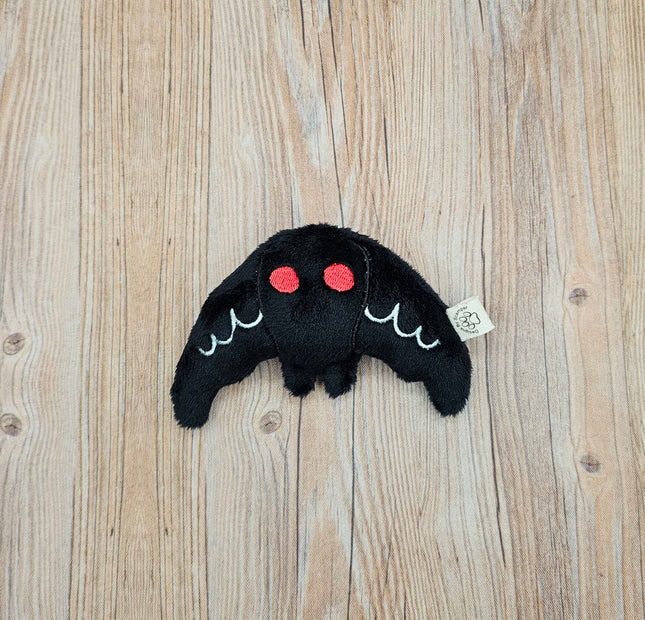 image of mothman cat toy with embroidered details