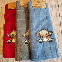 main image of embroidered polyester kitchen towels with a cute highland cow