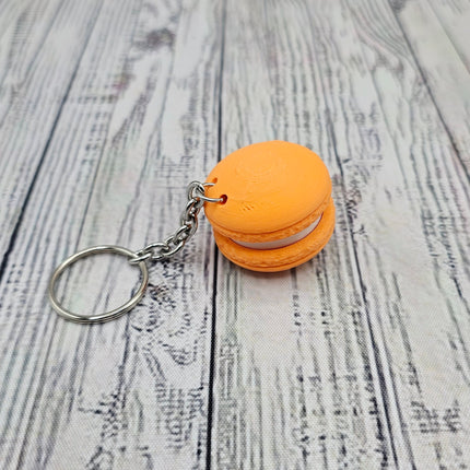image of orange option of macaron fidget keychain
